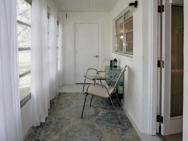 sunroom featuring plenty of natural light