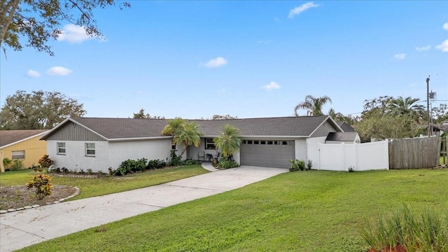 single story home with a garage and a front yard