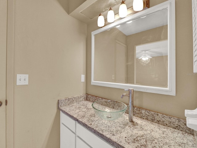 bathroom with vanity and ceiling fan