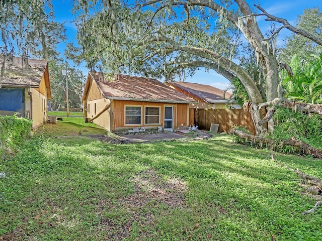 exterior space with a front lawn