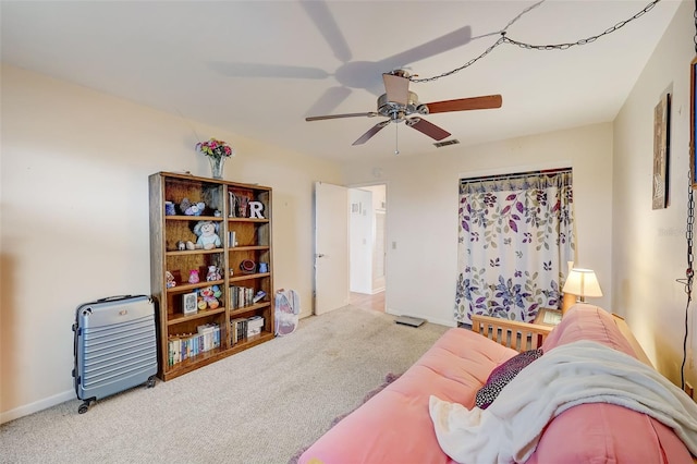 carpeted living room featuring ceiling fan