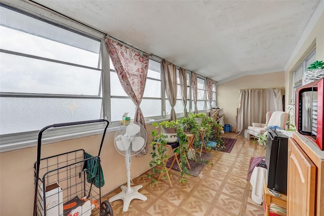 sunroom with lofted ceiling