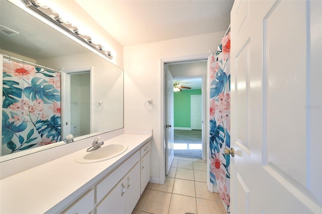 bathroom featuring vanity, tile patterned floors, and ceiling fan