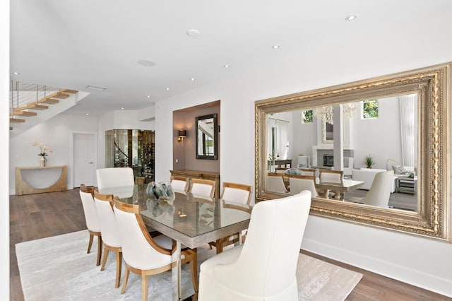 dining room with wood-type flooring