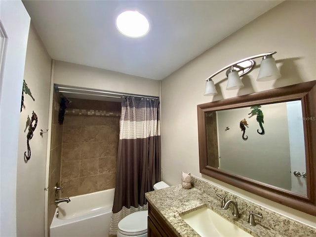 full bathroom with toilet, vanity, and shower / bath combo with shower curtain