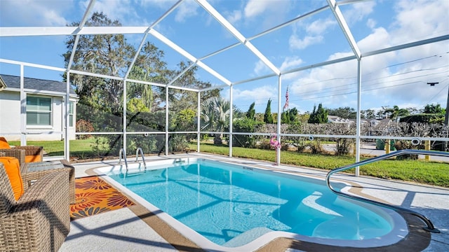 view of swimming pool with a yard, a lanai, and a patio