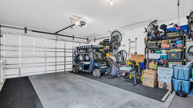 garage featuring a garage door opener