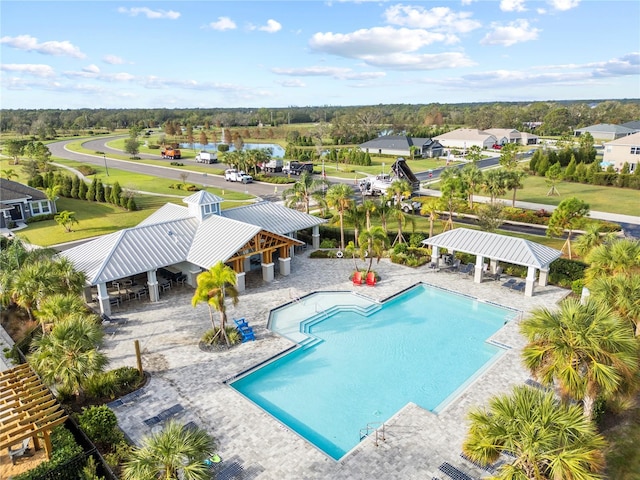 view of swimming pool with a patio and a gazebo