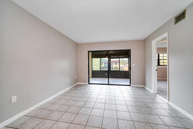 view of tiled spare room