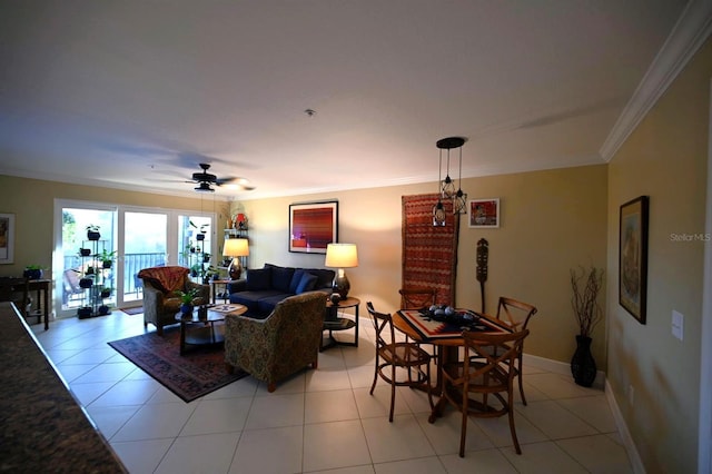 living room featuring light tile patterned floors, ceiling fan, and ornamental molding