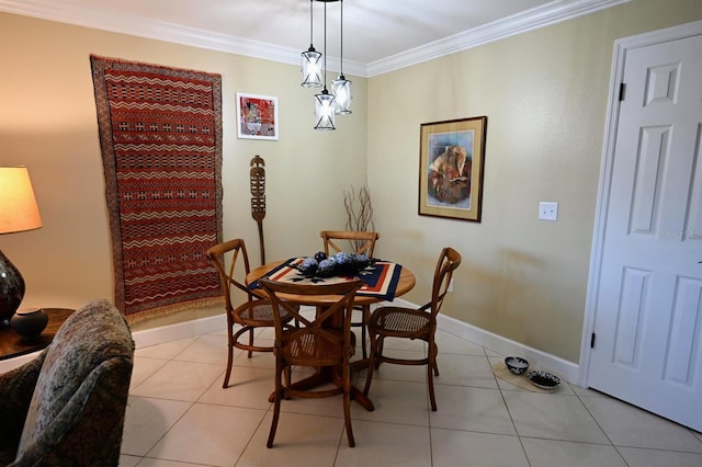 tiled dining room with crown molding