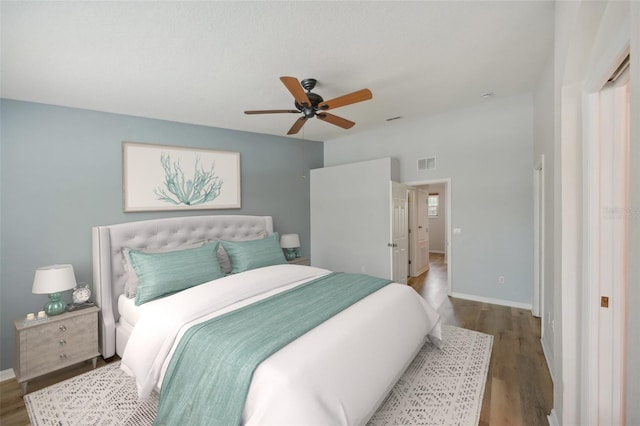 bedroom featuring hardwood / wood-style flooring and ceiling fan