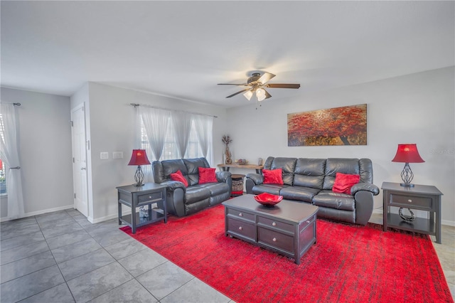 tiled living room with ceiling fan