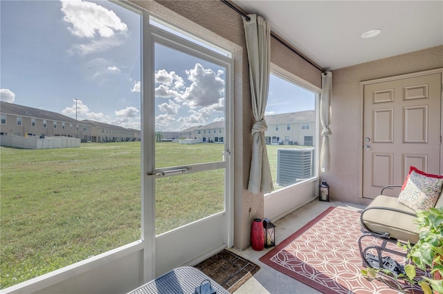 sunroom / solarium with a healthy amount of sunlight