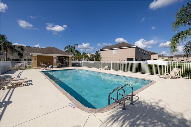 view of pool featuring a patio