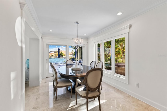 dining space featuring an inviting chandelier and ornamental molding