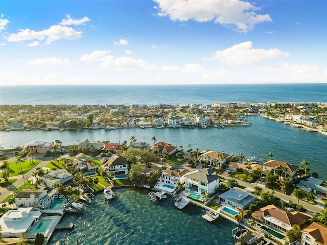 birds eye view of property featuring a water view