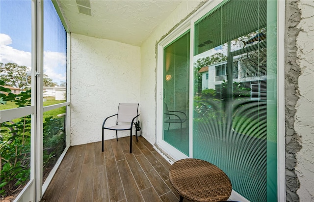 sunroom featuring a healthy amount of sunlight