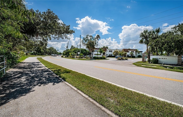 211 S Mcmullen Booth Rd Unit 189, Clearwater, FL 33759 - view of asphalt street featuring sidewalks, street lights, and curbs