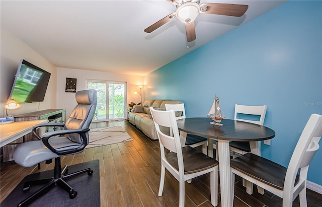 dining room with ceiling fan and wood-type flooring