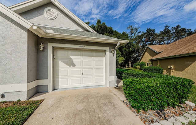 3647 Muirfield Ct, New Port Richey, FL 34655 - garage with concrete driveway