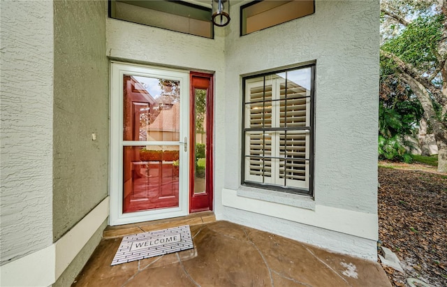 3647 Muirfield Ct, New Port Richey, FL 34655 - entrance to property with stucco siding