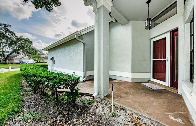 3647 Muirfield Ct, New Port Richey, FL 34655 - property entrance featuring stucco siding