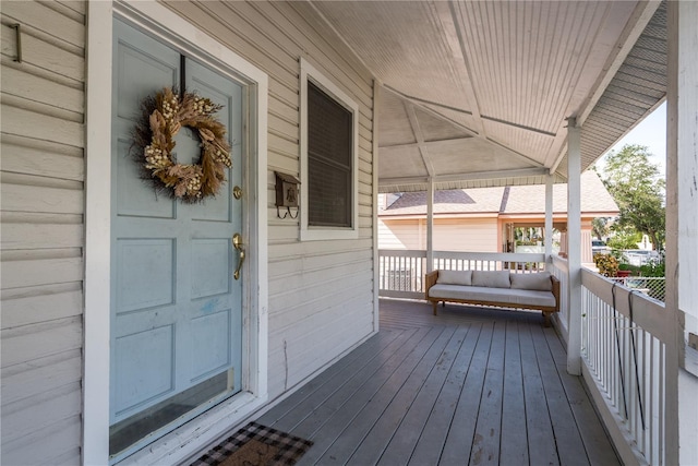 wooden deck featuring a porch