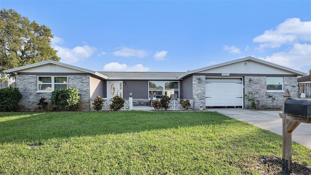 ranch-style house with a garage and a front yard