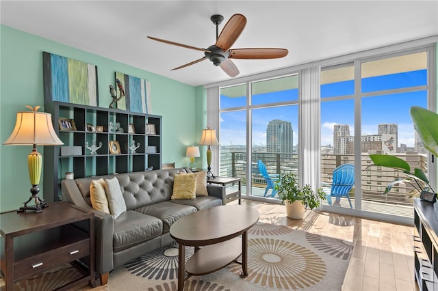 sunroom / solarium with ceiling fan and a wealth of natural light