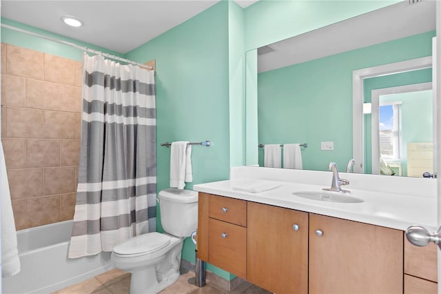 full bathroom featuring toilet, shower / bath combo, vanity, and tile patterned floors