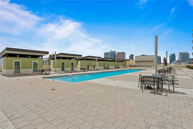 view of pool featuring a patio area