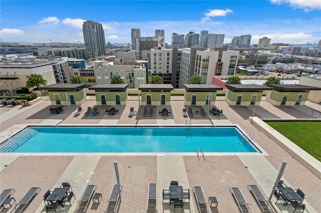 view of swimming pool featuring a patio area