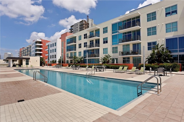 view of pool featuring a patio area