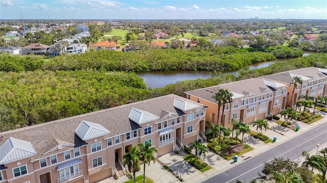 drone / aerial view with a water view