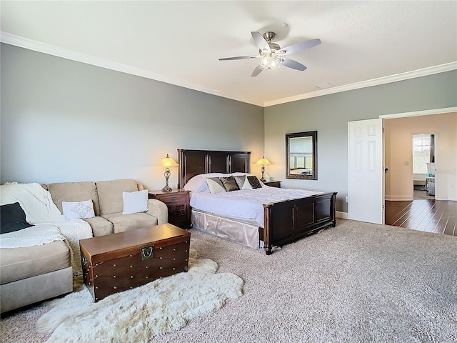 bedroom featuring ceiling fan, ornamental molding, and wood-type flooring