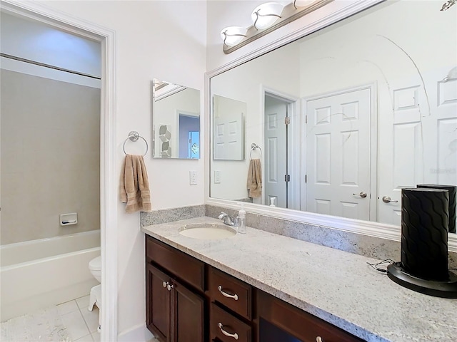 full bathroom featuring tub / shower combination, tile patterned floors, vanity, and toilet