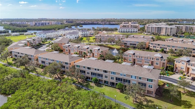 drone / aerial view with a water view