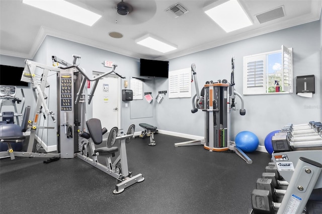 workout area featuring ornamental molding and ceiling fan