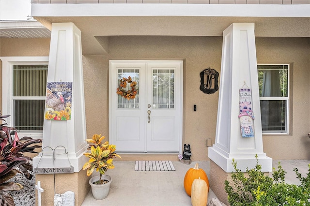 property entrance with a porch