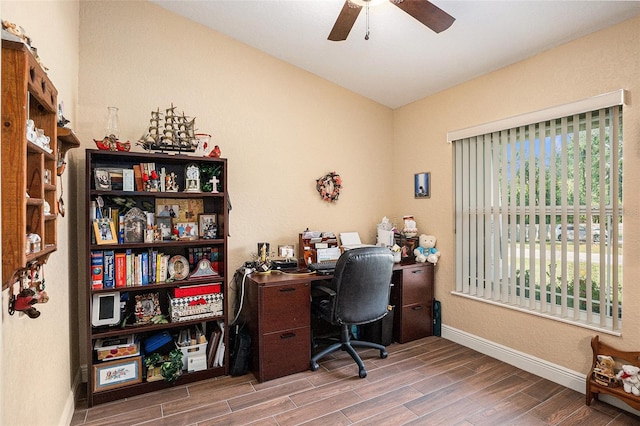 office space featuring lofted ceiling, hardwood / wood-style floors, and ceiling fan