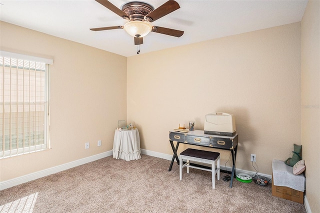 miscellaneous room featuring ceiling fan and carpet floors