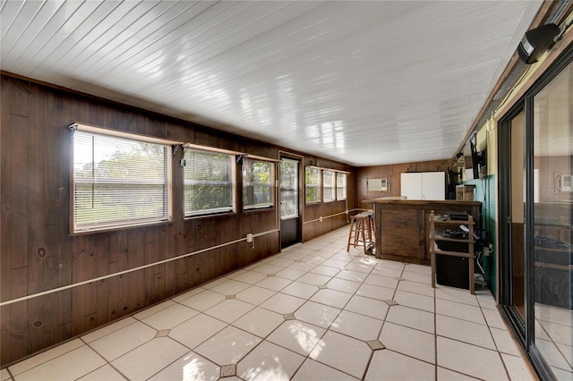 unfurnished sunroom with a healthy amount of sunlight