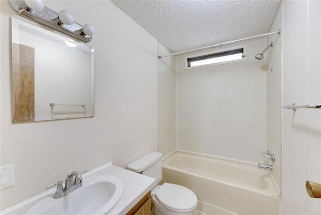 full bathroom featuring toilet, vanity, a textured ceiling, and tub / shower combination