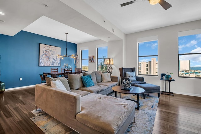 226 5th Ave N Unit 706, Saint Petersburg, FL 33701 - living room with dark wood finished floors, a ceiling fan, and a chandelier
