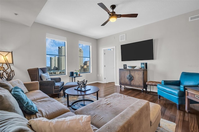 226 5th Ave N Unit 706, Saint Petersburg, FL 33701 - living area with baseboards, a ceiling fan, wood finished floors, and visible vents