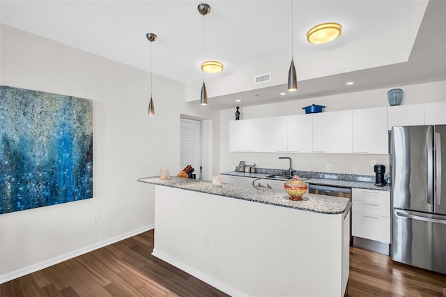 226 5th Ave N Unit 706, Saint Petersburg, FL 33701 - kitchen featuring appliances with stainless steel finishes, dark wood-style floors, white cabinetry, and a sink