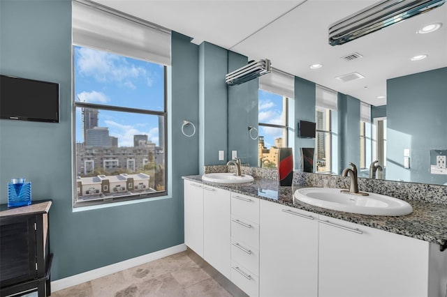 226 5th Ave N Unit 706, Saint Petersburg, FL 33701 - full bathroom with double vanity and recessed lighting