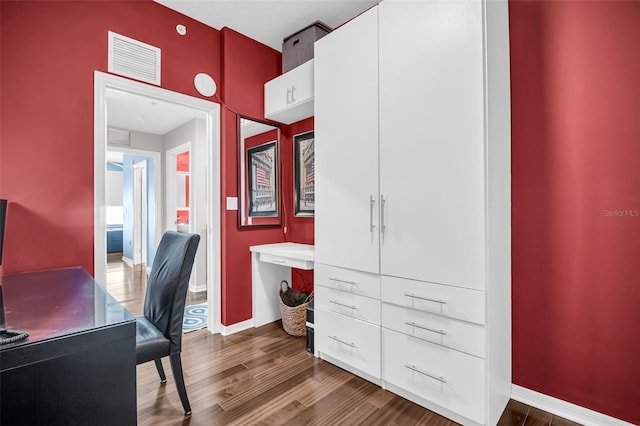 226 5th Ave N Unit 706, Saint Petersburg, FL 33701 - home office with baseboards, wood finished floors, and visible vents