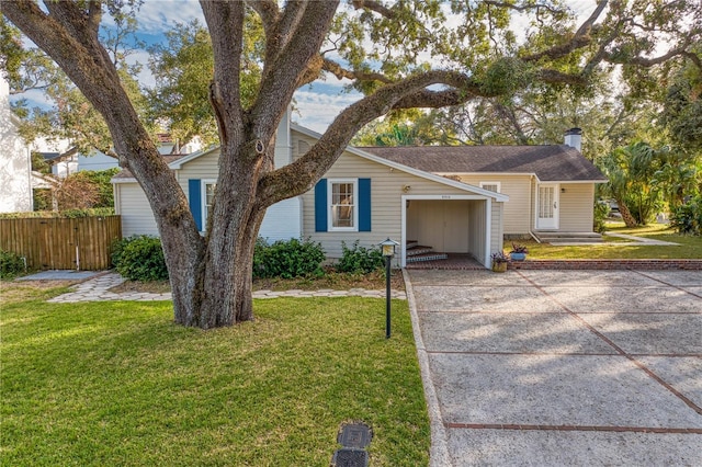 ranch-style home featuring a front yard